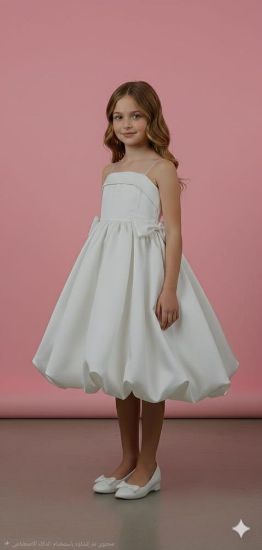 صورة فستان سهرة اناقة لؤلؤية تخطف الانظار